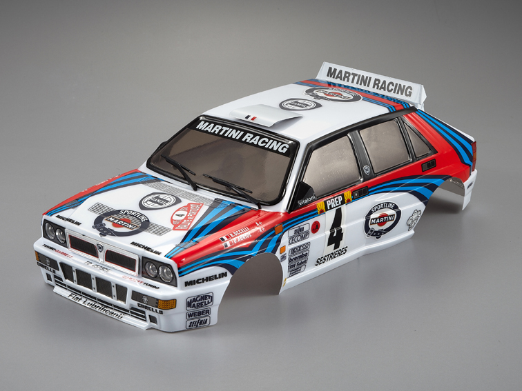 COCHE COMPLETO EN KIT LANCIA DELTA INTEGRALE SERIE EVO 1/7 +EQUIPO R/C  VOLANTE